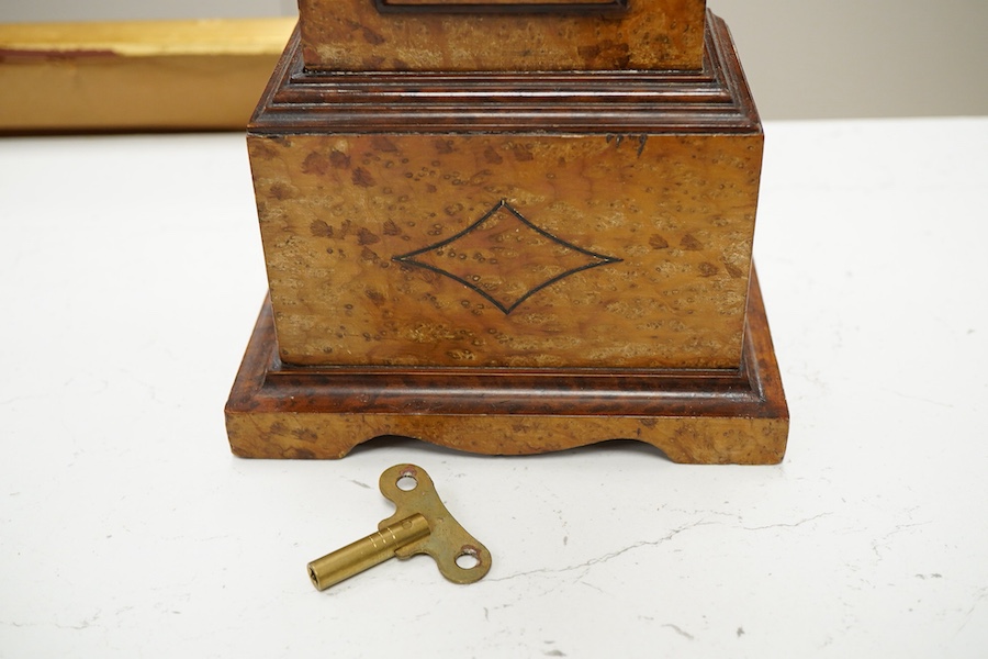 A small French amboyna model of a longcase timepiece, with key, 44cm high
